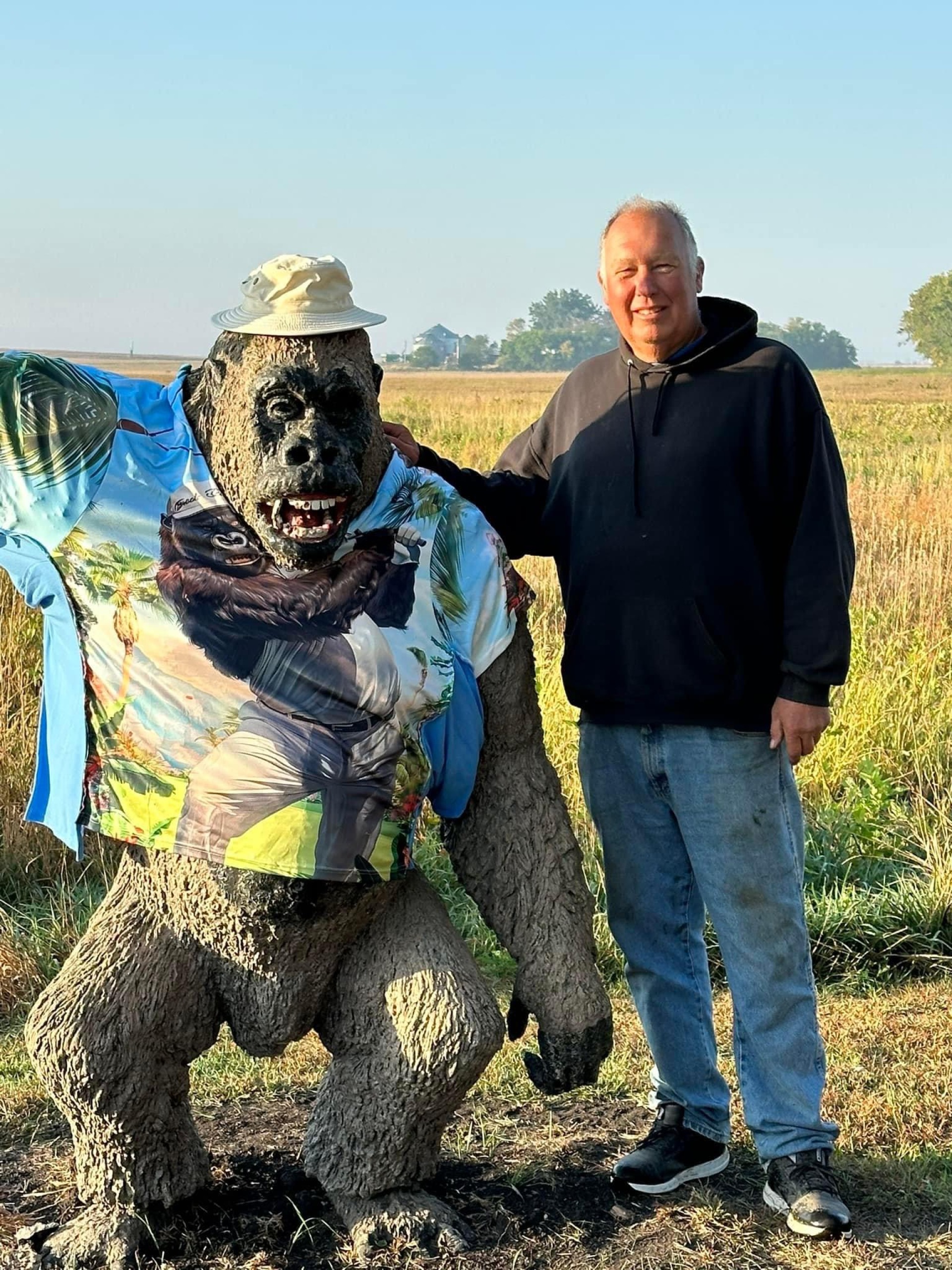 Brian Betten poses with Art's Art Gorilla.